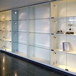 Contemporary display case - Shopkit - built-in / glass / stainless steel