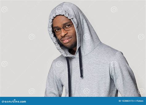 Black Young Guy Wearing Hoodie Posing Looking At Camera Stock Image