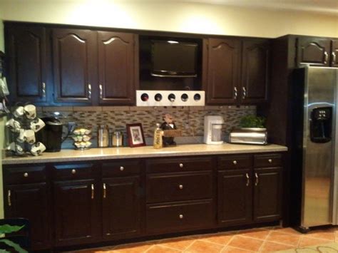 Just remember to use the right type of bleach or wood stain to get the results you want. Staining Kitchen Cabinet to Refresh Your Kitchen - My Kitchen Interior | MYKITCHENINTERIOR
