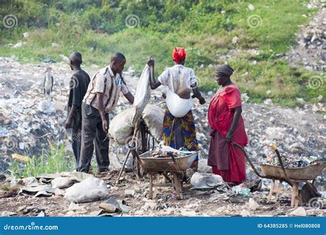 African People Collecting Recyclables From Trash Editorial Image