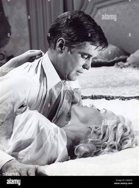 GEORGE PEPPARD With Carroll Baker In The Carpetbaggers Still AKA George Peppard Jr Credit