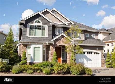 New Beautiful Suburban House With Blue Sky And Clouds Stock Photo Alamy