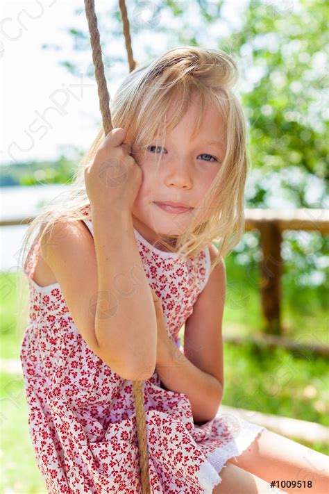Outdoor Portrait Of A Cute Little 5 Year Old Girl Stock Photo