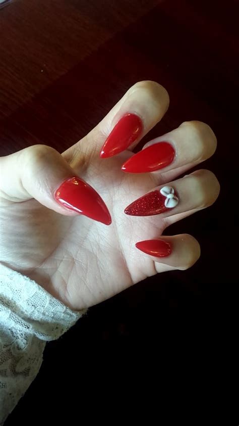 Simple But So Cute Red Stiletto Nails With A Bow For Valentines Day