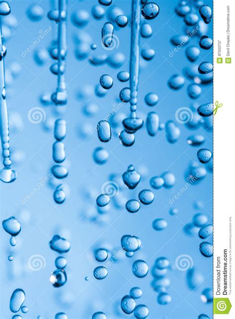Falling Water Drops On Blue B Stock Image Image Of