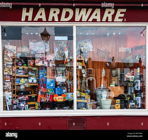 A Hardware Store Shop Window With A Display Of Assorted Tools
