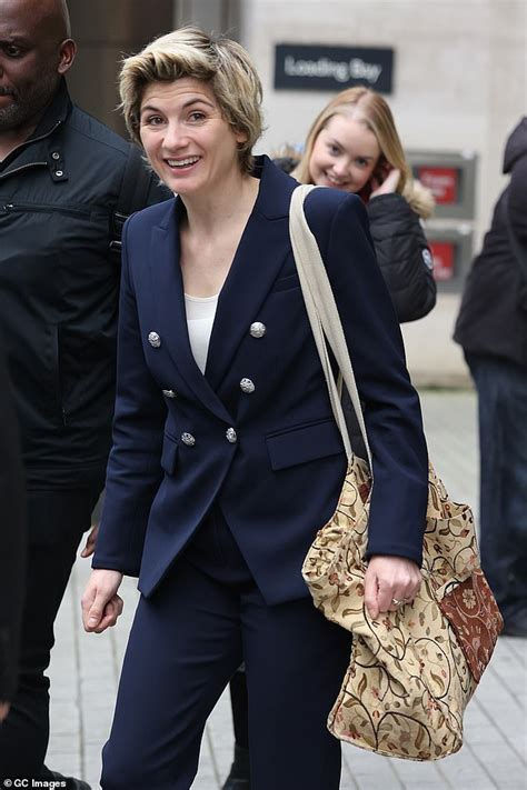 jodie whittaker the first female time lord looks stylish in navy suit as she heads to bbc