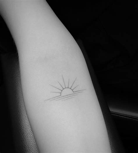 Elegant Sunrise Tattoo By Jakub Nowicz Tattoogrid Net