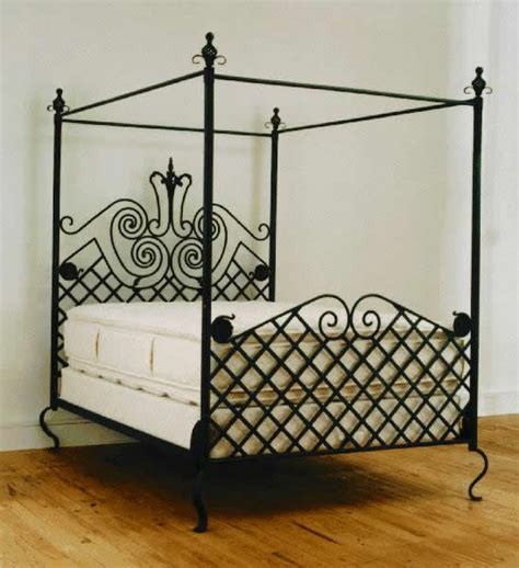 #rustic #rustic living #wrought iron bed #sheep skin throw #wooden crate #enamel pots #linen bedding #green bedding #australian interiors #minimal interiors #pitched roof #hardwood floor #white interiors #interiors #interior design #interior ideas. Black rod iron queen sized bed.....so cool for Penny | Wrought iron beds, Iron bed, Iron bed frame