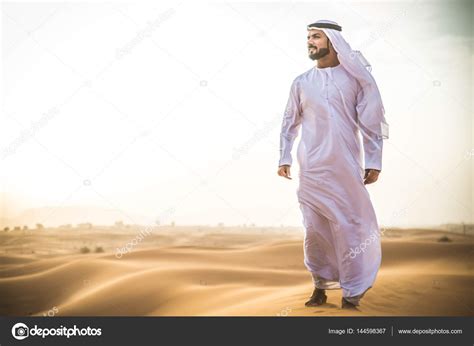 Arabian Man In Desert Stock Photo By ©oneinchpunch 144598367