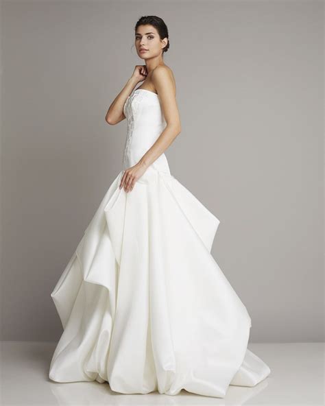 Extravagant Strapless Wedding Dress With Embroidery On The Upper Part