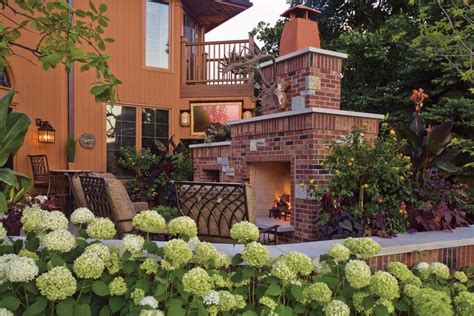 Outdoor Brick Fireplace And White Hydrangeas Hgtv