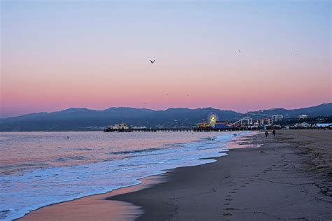 The Santa Monica Pier From Venice Beach Venice Ca Sunrise Photograph By