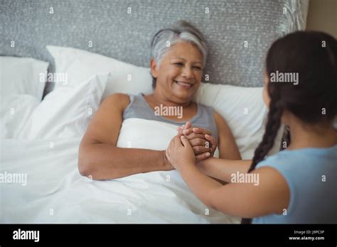 Grandmother Comforting Granddaughter Hi Res Stock Photography And