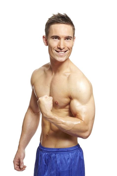 Muscular Young Man Flexing Arm Muscles In Sports Outfit Stock Image Image Of Caucasian