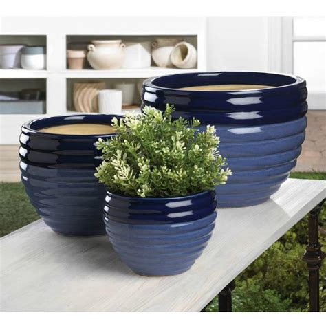 Many sizes and styles available. Two-Tone Blue Ceramic Planter Set