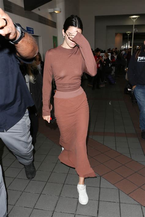 Kendall Jenner Frees The Nipple In A Sheer Sweater At The Airport Teen Vogue