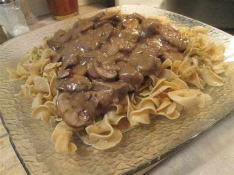 Add steak to onion and pour beef stock over steak; Diab2Cook: Steak Tips with Peppered Mushroom Gravy w ...
