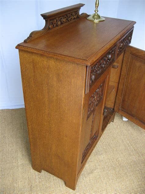 Arts And Crafts Cupboard With Carved Trees Antiques Atlas