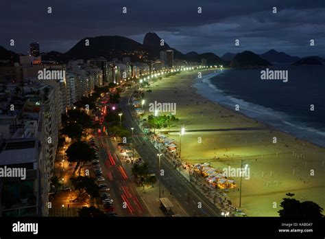 Traffic Along Avenida Atlantica And Copacabana Beach At Dusk Rio De