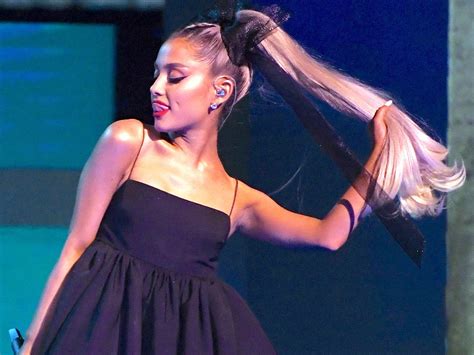 Why Ariana Grande Always Wears Her Hair Up In That Iconic High Ponytail