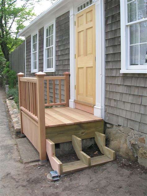 We think aesthetically it looks wonderful. Building the new front steps | Front porch steps, Porch ...