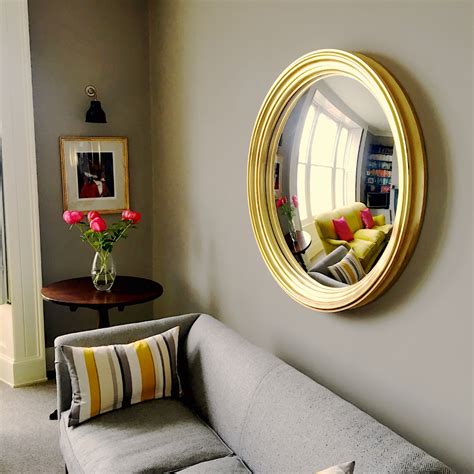Adding interest to a mirror frame with gilding - Omelo Mirrors Omelo Decorative Convex Mirrors