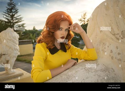 Beautiful Red Haired Girl With Red Lips On The Str Stock Photo Alamy