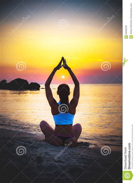 Women Meditation Pose At Amazing Sunset Stock Photo Image Of Lotus