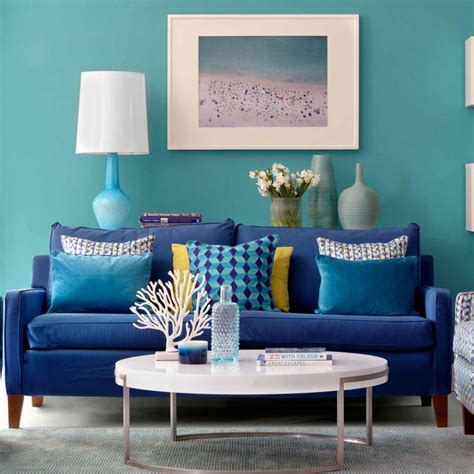 Gorgeous green walls in a colorful living room. Living room colour schemes