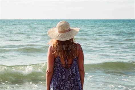 Rear View Of Middle Aged Woman On The Beach Stock Image Image Of