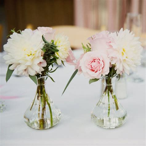 Arrange Multiple Small Flower Arrangements On Tables Rather Than