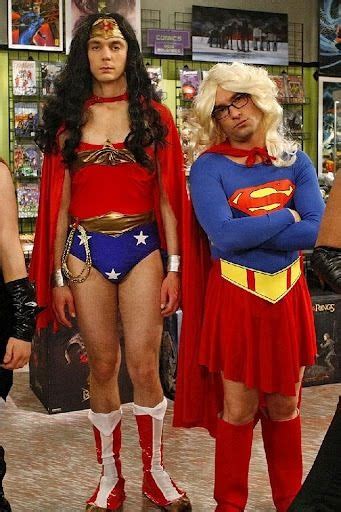 Three People Dressed Up As Supergirls In A Store With One Woman Wearing