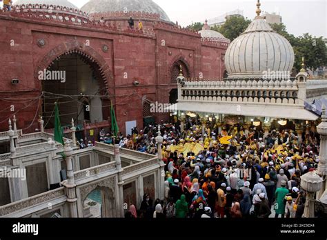 Devouts Throng The Nizamuddin Dargah Embraced In Yellow On The Occasion