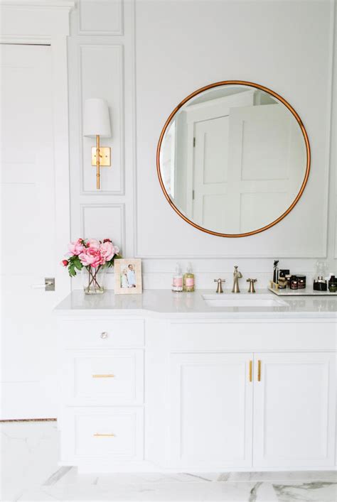 A round bathroom mirror can add softness to a bathroom and moves away from traditional straight lines. Fall's Bathroom Trend: Round Mirrors - 24 East