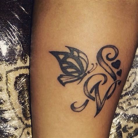If you have a vision, we have … S N Lettring initial avec tatouage de papillon #Tatouage # ...