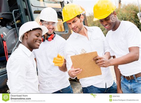 Men Working On A Construction Site Royalty Free Stock Photo Image
