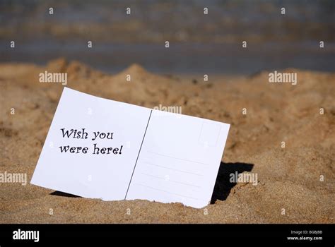 Wish You Were Here Postcard On A Beach Stock Photo Alamy