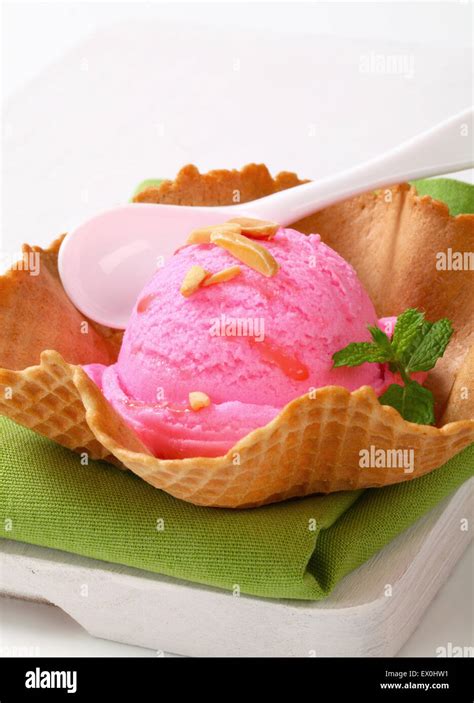 Pink Fruit Flavored Ice Cream In A Waffle Basket Stock Photo Alamy