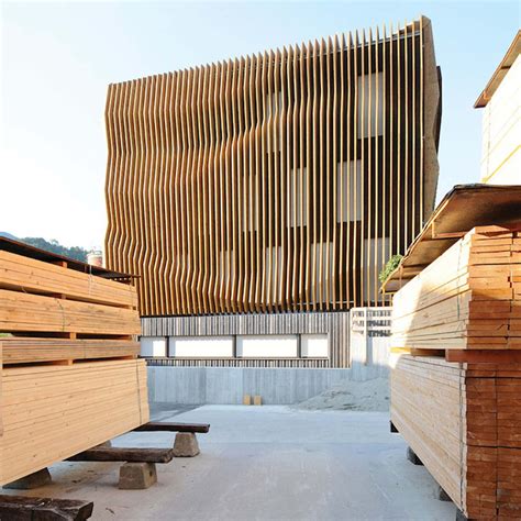 Stunning Wood Facade Appears As Rippling Waves On An