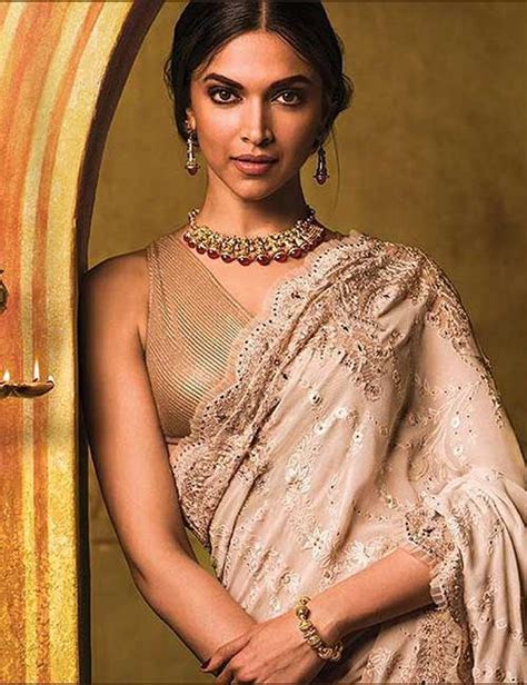 All you need is a pair of statement earrings, and you are done! 50 Latest Saree Blouse Designs For 2019 That Will Amaze You