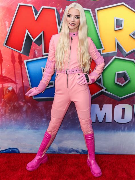 Anya Taylor Joy Wears Pink Racing Suit At Super Mario Screening In La