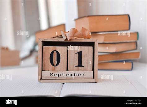 Wooden Calendar With Numbers 1st September On The Table At Home Stock