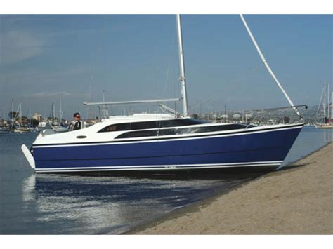 It was the first production boat featuring a retractable bowsprit, which allows for an unusually large asymmetric. 2009 MacGregor 26M | Most Sailboats 2009 MacGregor 26M ...