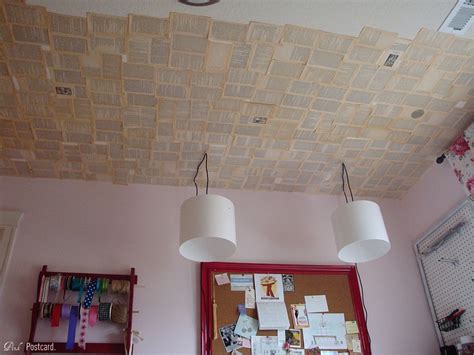 Designed to cleverly fit into any unused space, a custom craft room is the perfect place for everyone whether they enjoy scrapbooking, sewing, or painting. craft room update- book page ceiling and modern task ...