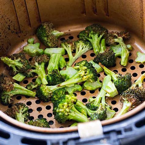 Spray the frying basket with olive oil spray. Air Fryer Roasted Broccoli - Skinny Southern Recipes