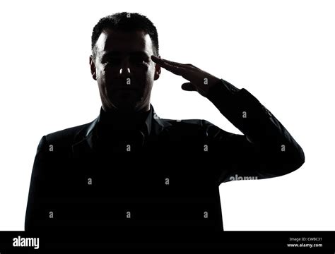 One Caucasian Man Army Salute Gesture Portrait Silhouette In Studio
