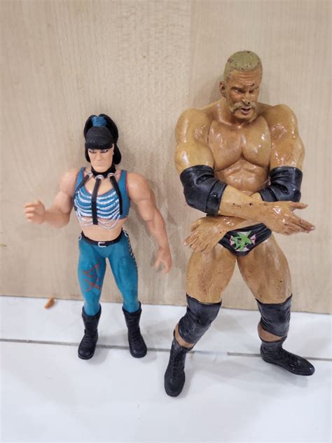 Triple H And Chyna Statue Hobbies And Toys Toys And Games On Carousell