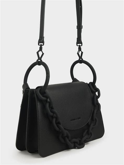 Based in singapore, the brand has a global footprint across asia, europe, latin america and africa. Black Chunky Chain Link Shoulder Bag | CHARLES & KEITH US