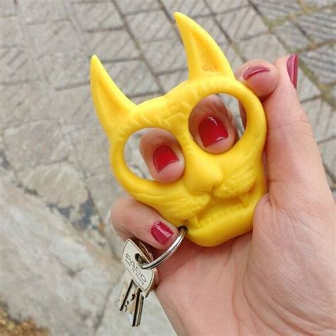 Safety first kitty key chain. Oh yeah, Lala! — Cat knuckles keychain 💖 #kawaiiweapon...